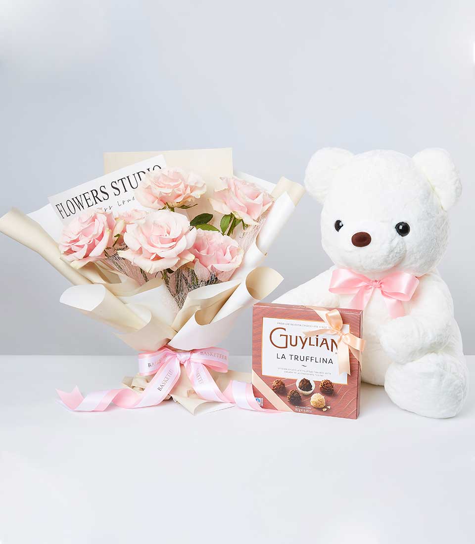 Pink roses bouquet with white teddy bear and chocolates gift set