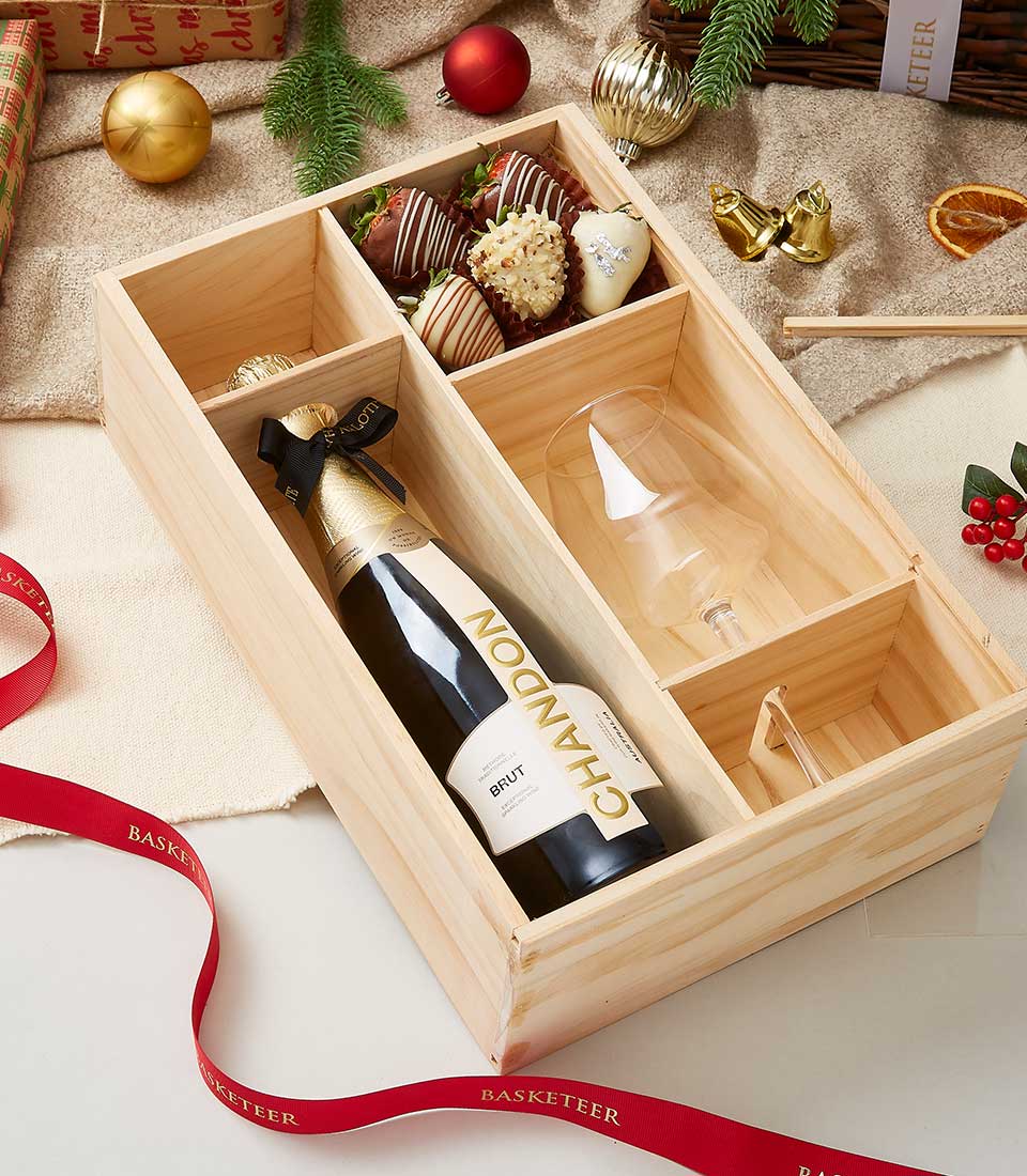 Premium wooden gift box with sparkling wine, chocolate-dipped strawberries, and champagne flute