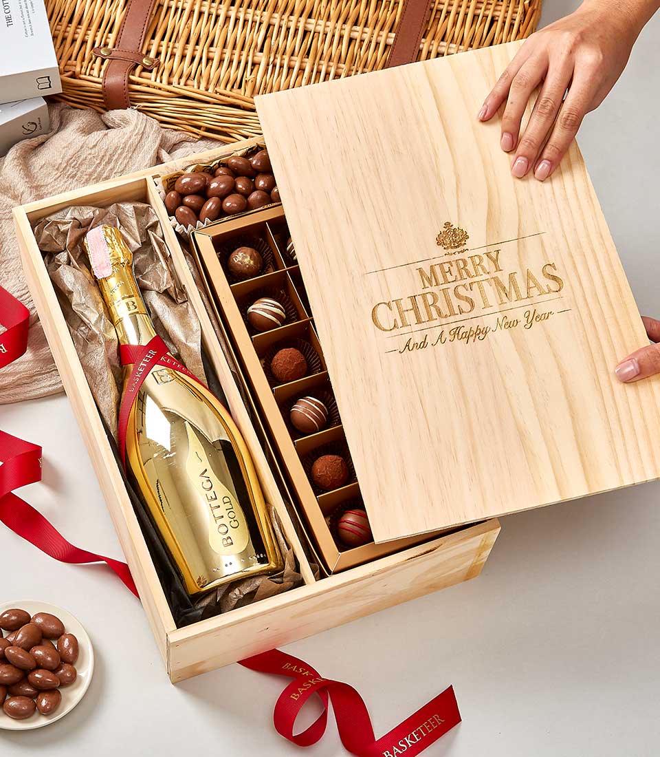 Luxury wooden gift box with Bottega Gold champagne and assorted handcrafted chocolates and truffles for festive celebration