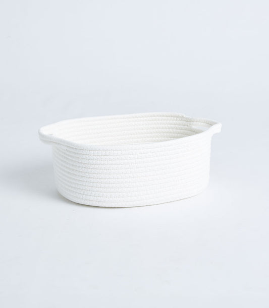 White cotton rope oval storage basket with dual handles, minimalist woven design