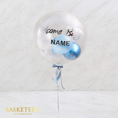 Personalised welcome baby blue bubble balloon with custom name inside, silver cursive text, perfect for new arrival
