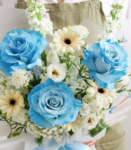 A romantic blue rose bouquet from Flowers by Basketeer, featuring vibrant premium blue roses