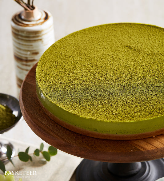 Creamy matcha cheesecake with vibrant green tea powder, elegant gift for celebrations and special occasions