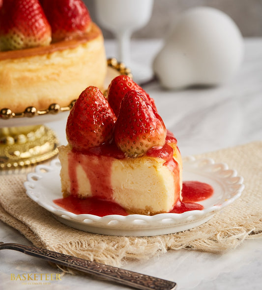 Classic New York strawberry cheesecake slice with fresh berries and creamy filling for celebration cakes