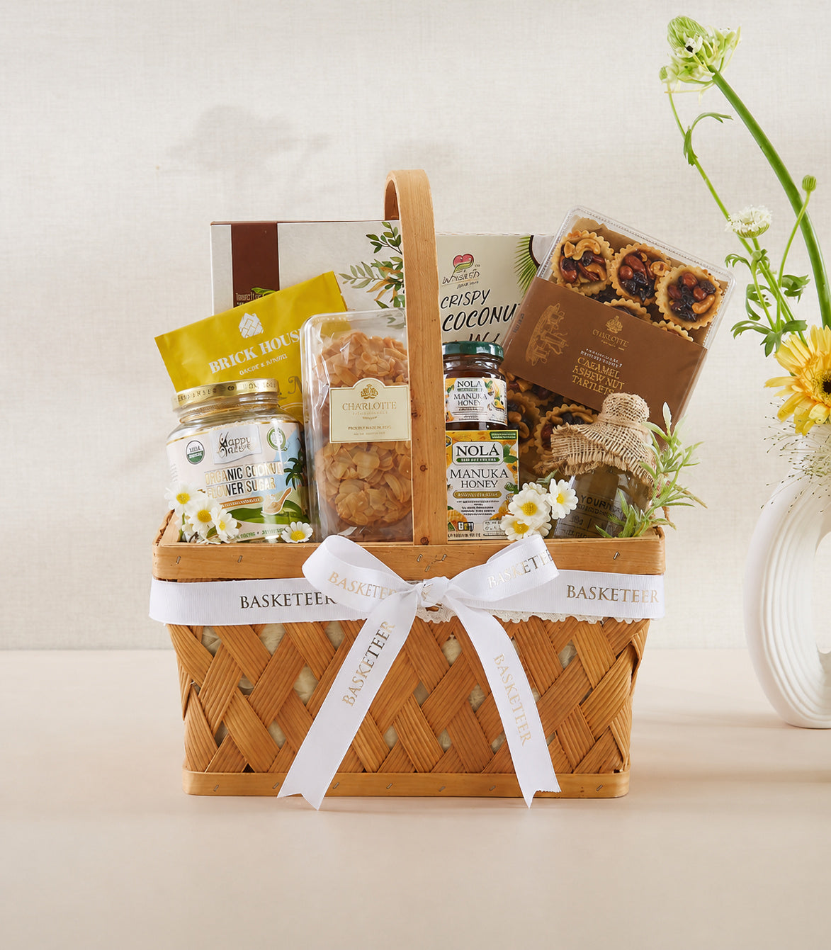 Basketeer luxury gift hamper with woven wooden basket, white ribbon, Nola