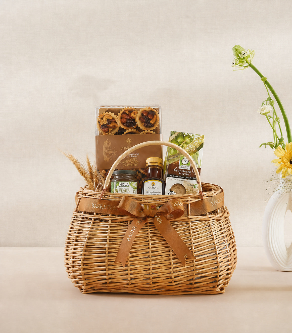 Basketeer luxury nut gift hamper in a woven wicker basket,