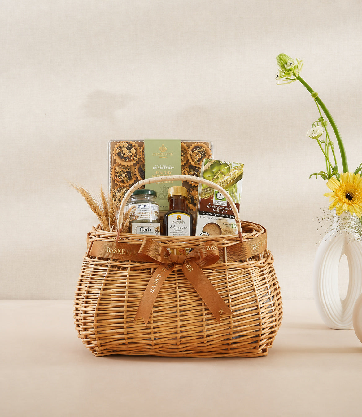 Basketeer luxury gourmet gift basket with woven wicker, elegant brown ribbon, Italian