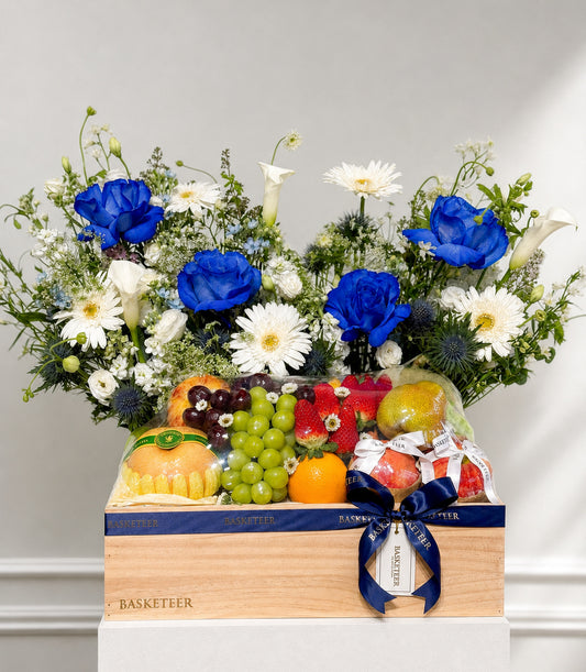 Basketeer's premium fruit gift in a light wooden crate, featuring vibrant