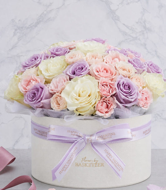 An elegant flower box arrangement from Flowers by Basketeer, featuring a luxurious mix