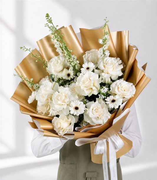 Basketeer luxury flower gift with elegant white roses, daisies, and stock flowers