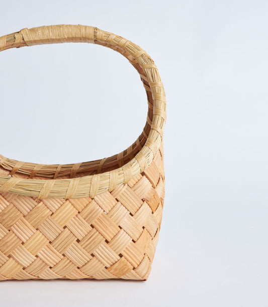 Basketeer's beautifully woven natural bamboo oval basket, a premium