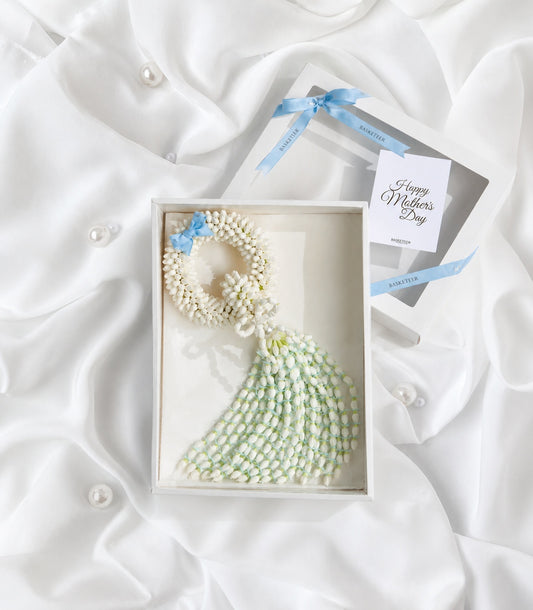 Basketeer luxury Mother's Day gift featuring a fragrant jasmine garland in