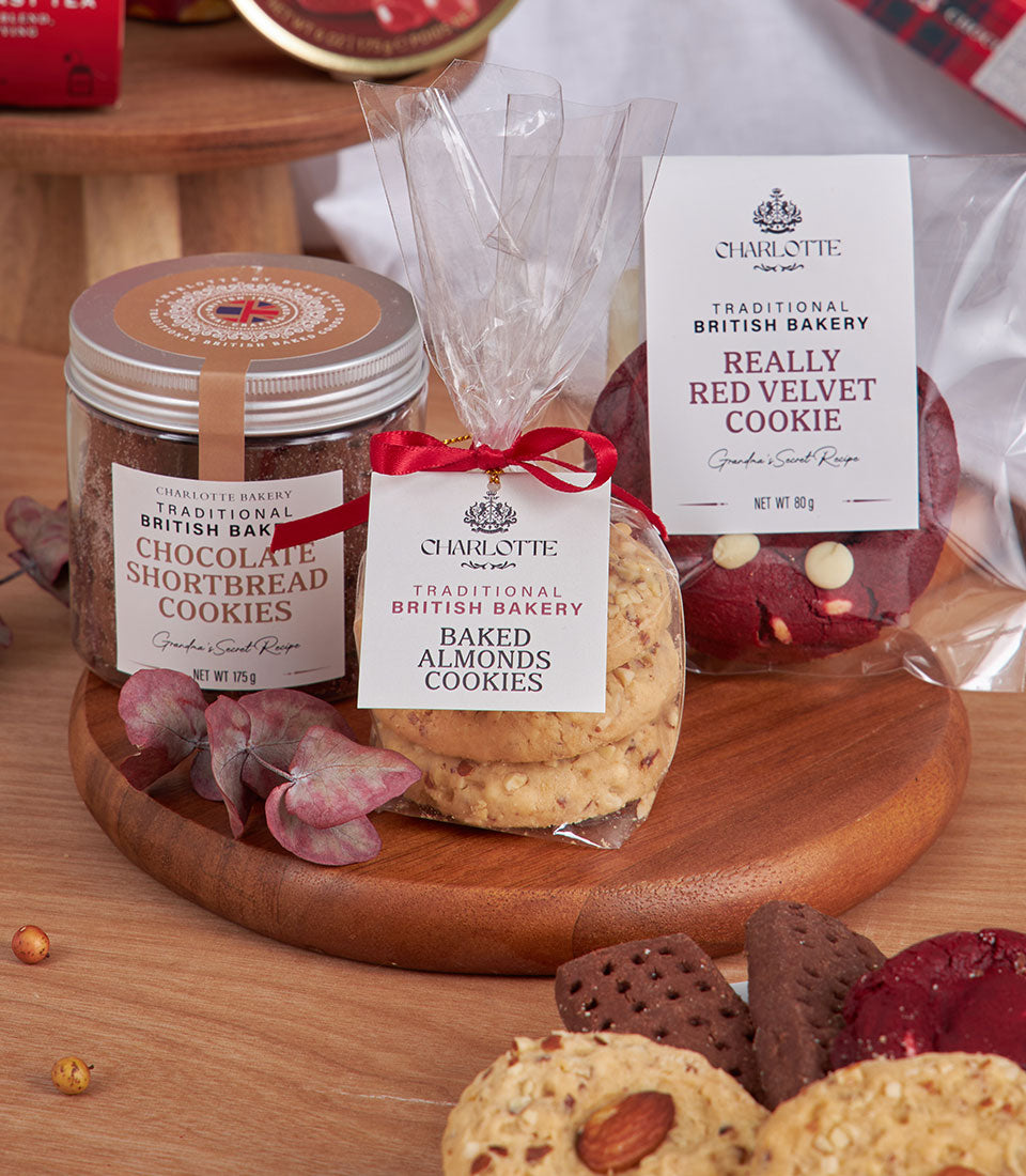 A premium dessert gift from Basketeer, featuring traditional British bakery cookies: chocolate shortbread, almond, and red velvet flavors. A Bangkok luxury gift basket.