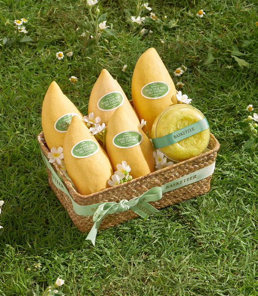 Premium Nam Dok Mai mango basket with sticky rice, light green ribbon, artisan gift hamper