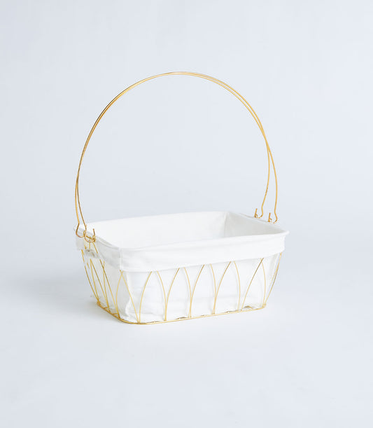 Gold wire basket with white fabric lining and arched handle for luxury gift presentation