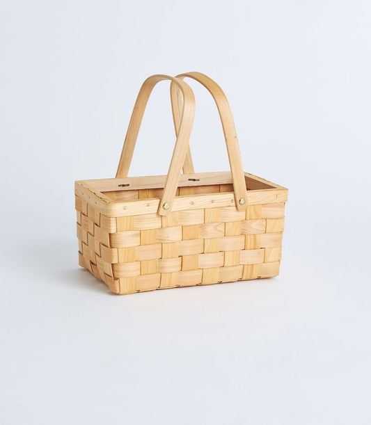 Natural woven bamboo rectangular basket with dual wood handles for curated gift hampers