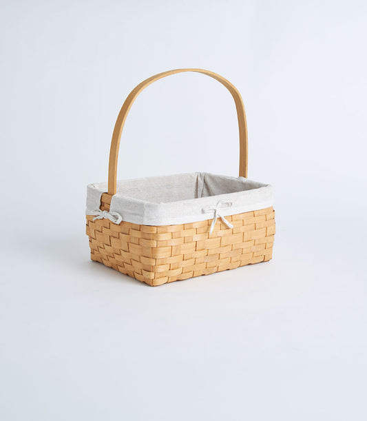 Basketeer's premium natural wooden weave basket with a warm, elegant