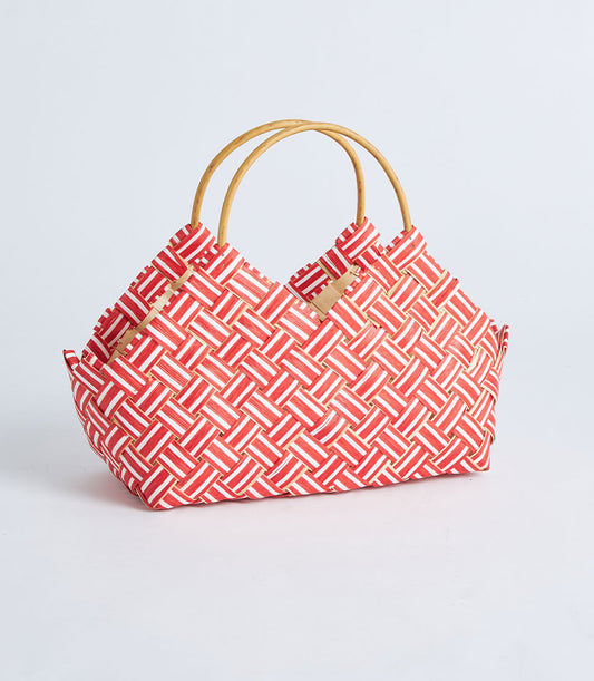 Red and white striped woven gift basket with wooden handles