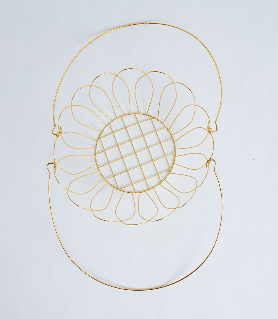 Gold metal wire basket with sunflower petal design and dual handles for premium gifting