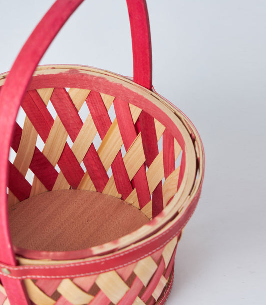 Basketeer's vibrant two-tone bamboo basket, featuring natural wood and
