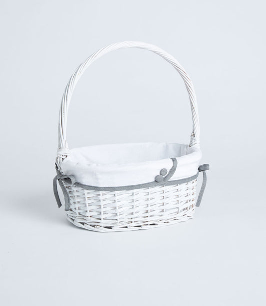 Handwoven white wicker basket with tall handle and grey ribbon trim detail