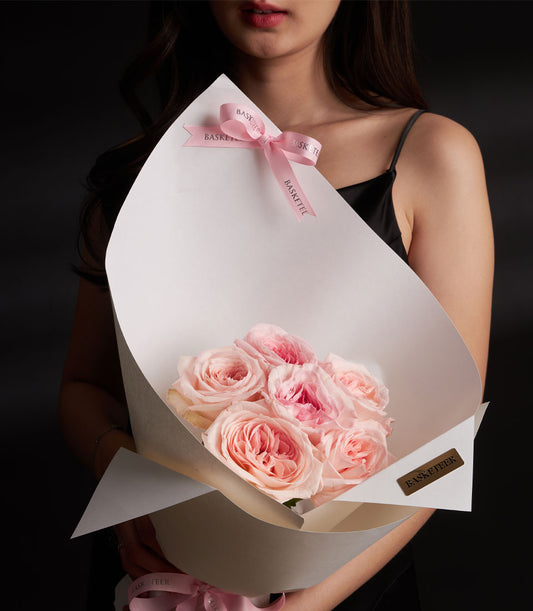 Light pink Ecuador roses Valentine bouquet tied with ribbon and gift tag