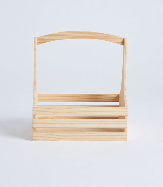 Basketeer's premium natural wood hamper basket with elegant arched handle,