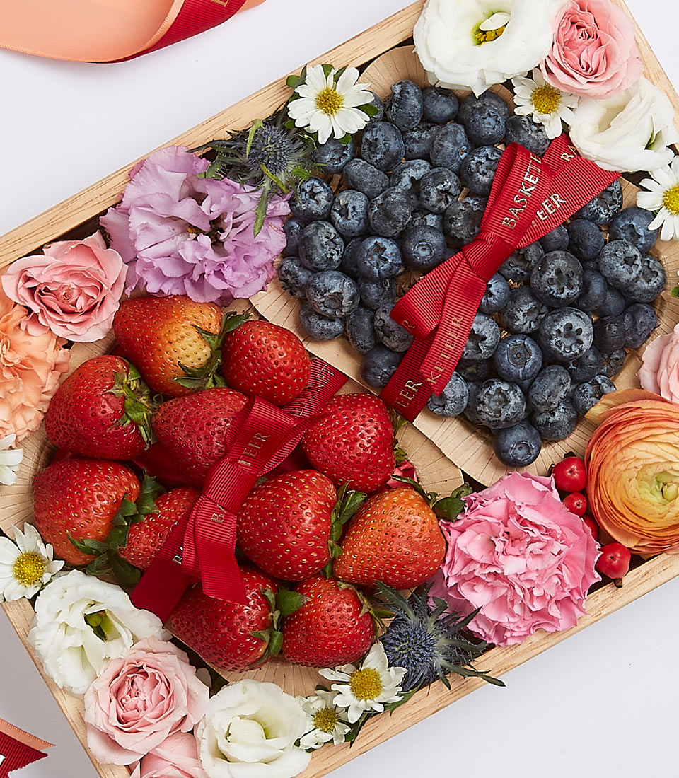 Premium wooden gift box with fresh blueberries, strawberries, and mixed roses and carnations