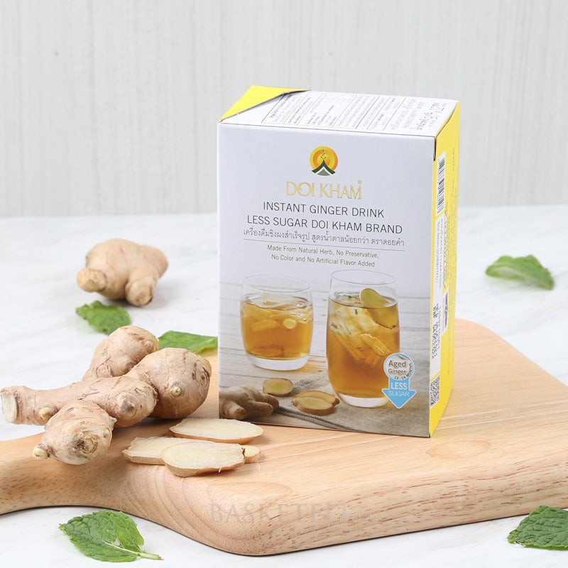 Premium instant ginger drink with fresh ginger and mint on wooden board, less sugar option