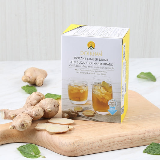 Premium instant ginger drink with fresh ginger and mint on wooden board, less sugar option