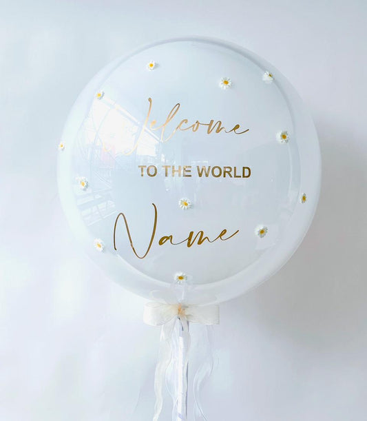 Welcome to the World personalised bubble balloon with white daisies and gold lettering, new baby gift