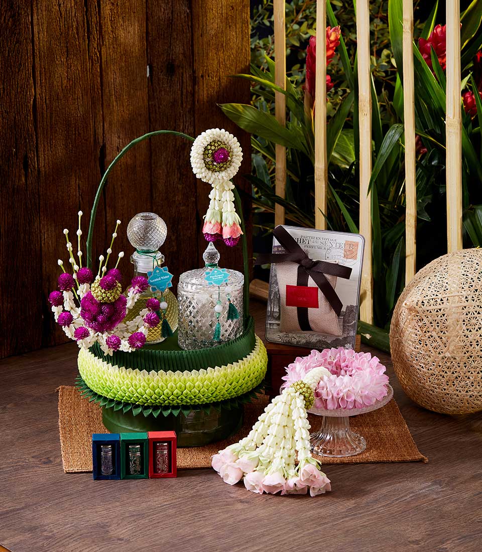 Songkran Thai New Year gift set with scented water, jasmine garlands, and artisan incense sachet