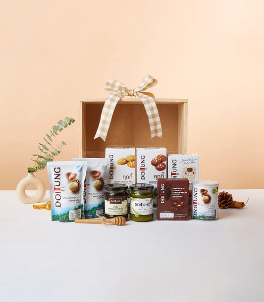 Exquisite Doi Tung Crafts gift box with macadamia nuts, honey, matcha, cookies, and artisan treats