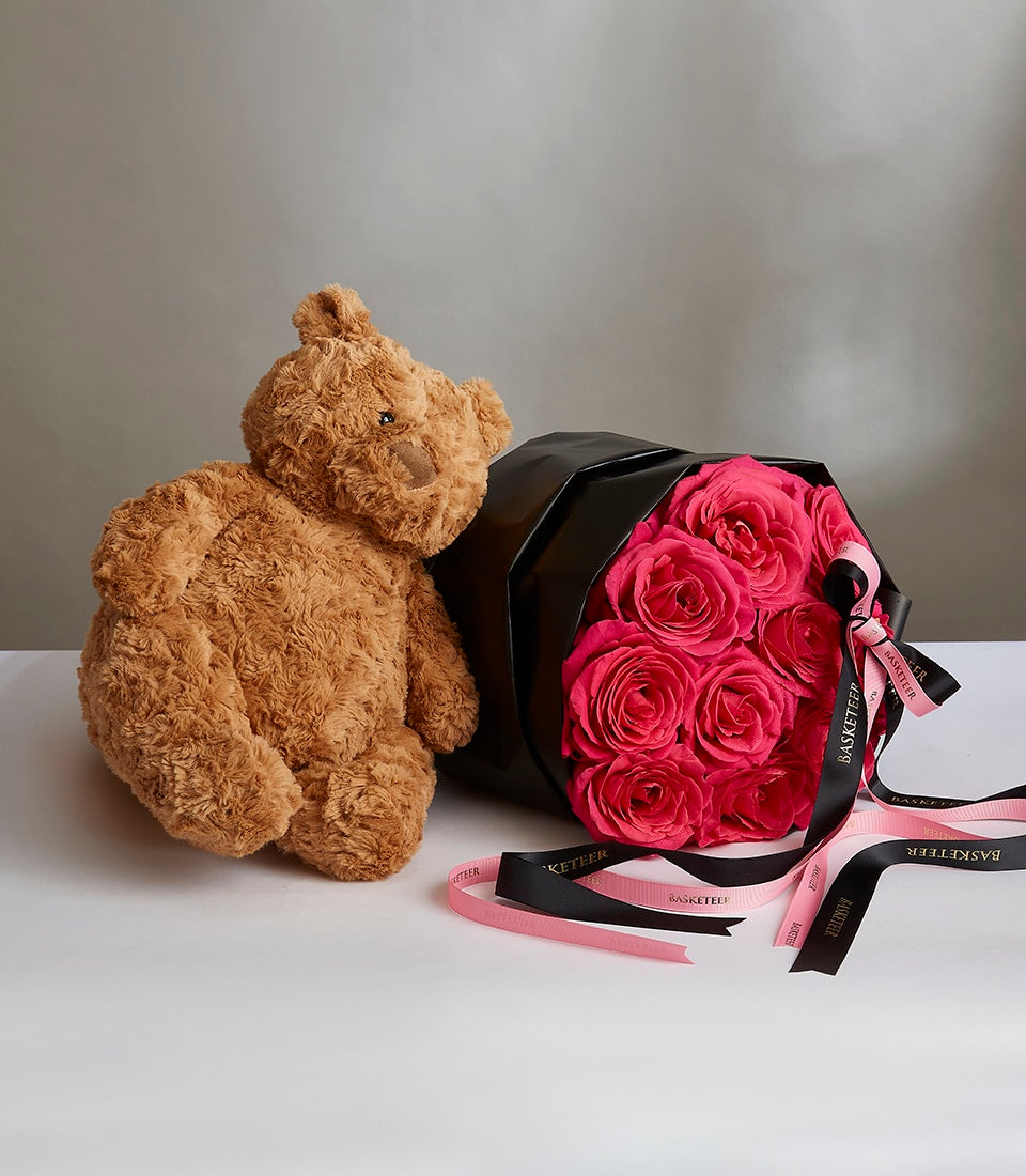 Brown teddy bear with vibrant pink roses in black hexagonal box, Valentine's Day gift combo