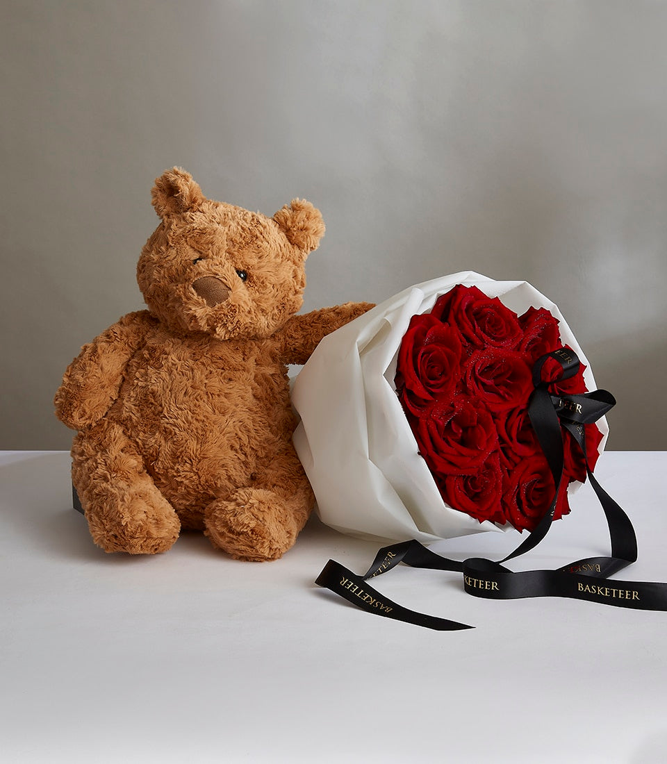 Red roses bouquet with teddy bear and gold-lettered black ribbon, romantic Valentine's gift set