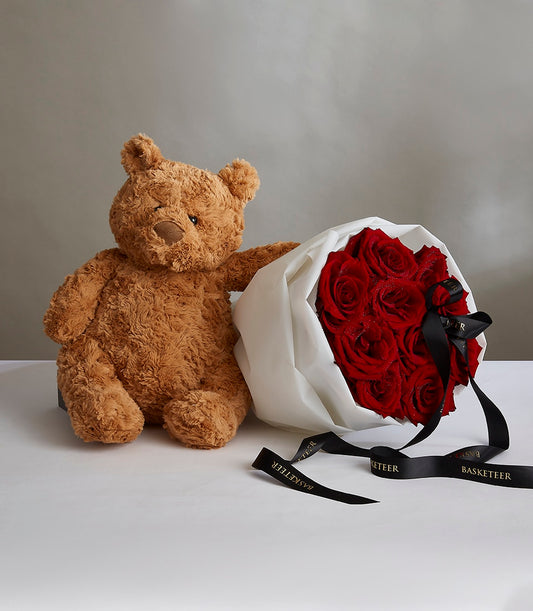 Red roses bouquet with teddy bear and gold-lettered black ribbon, romantic Valentine's gift set