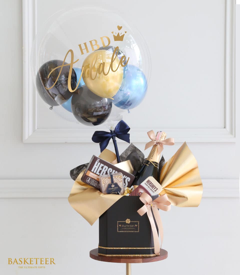 Bubbly balloon wine gift set with sparkling wine, Hershey's chocolates, and personalised HBD balloon in black and gold