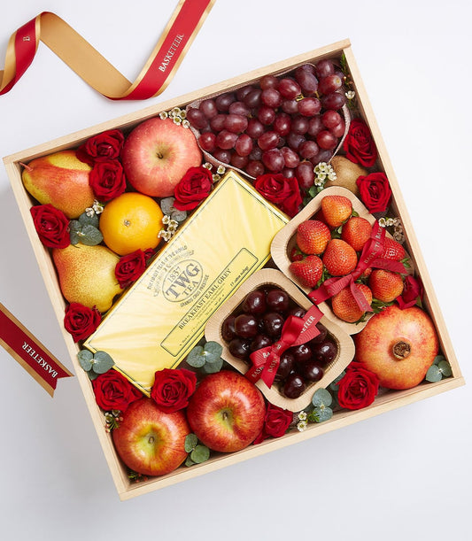 Premium fresh fruit selection with TWG tea and roses in luxury wooden gift box