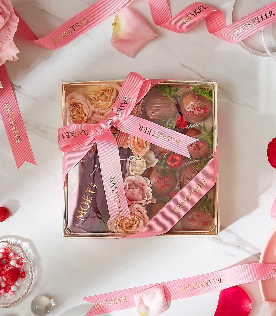 Premium Valentine wine gift box with Moët champagne, chocolate strawberries, and fresh pink roses