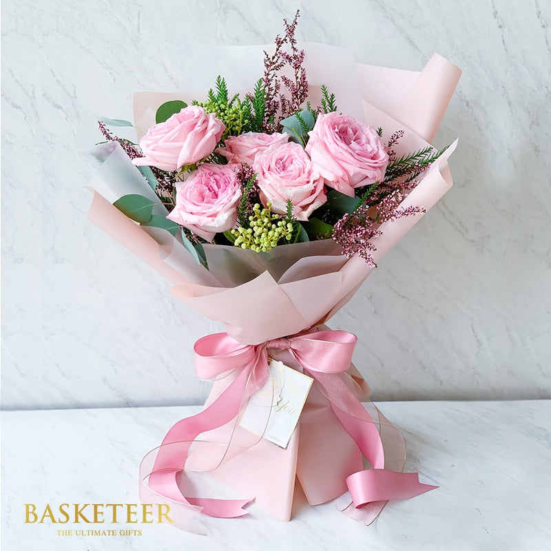 Pink O'Hara roses with purple filler and satin bow, premium fresh flower bouquet for gifting