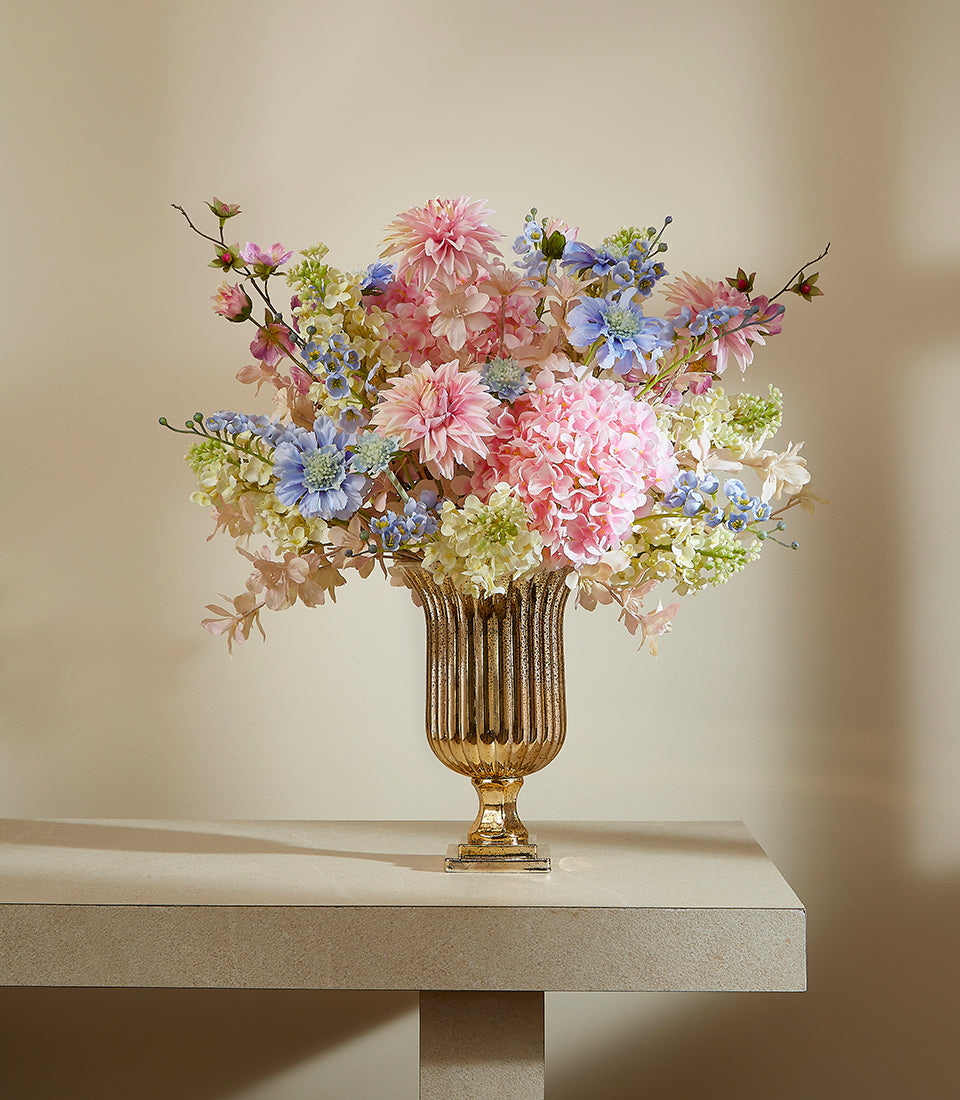 Emerald Morning Renewal artificial flower arrangement with pink dahlias and hydrangeas in gold fluted urn vase
