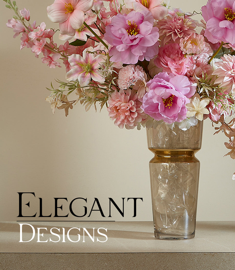 Springtime Serenade artificial flower arrangement in pink peonies and dahlias, amber glass vase