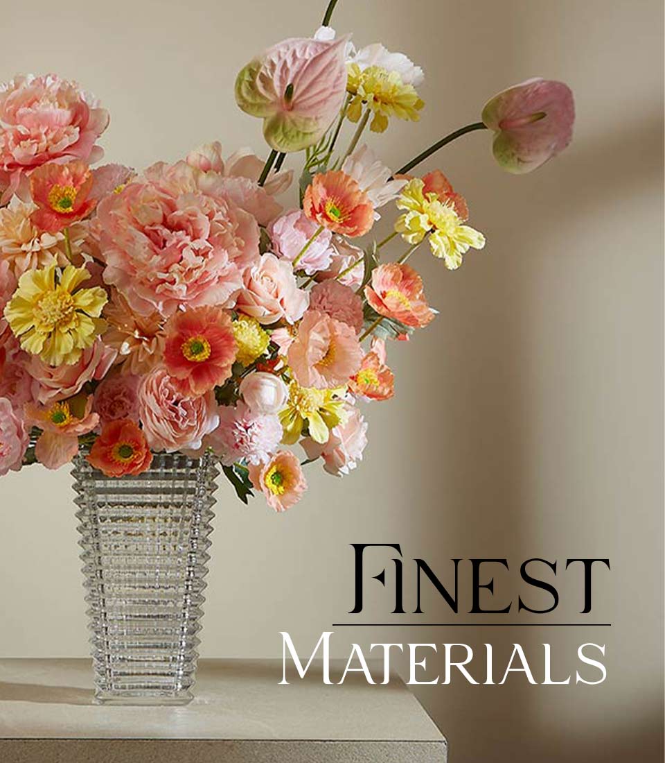 Eternal Summer Embrace artificial flower vase with pink, peach, and yellow peonies in ribbed glass vessel