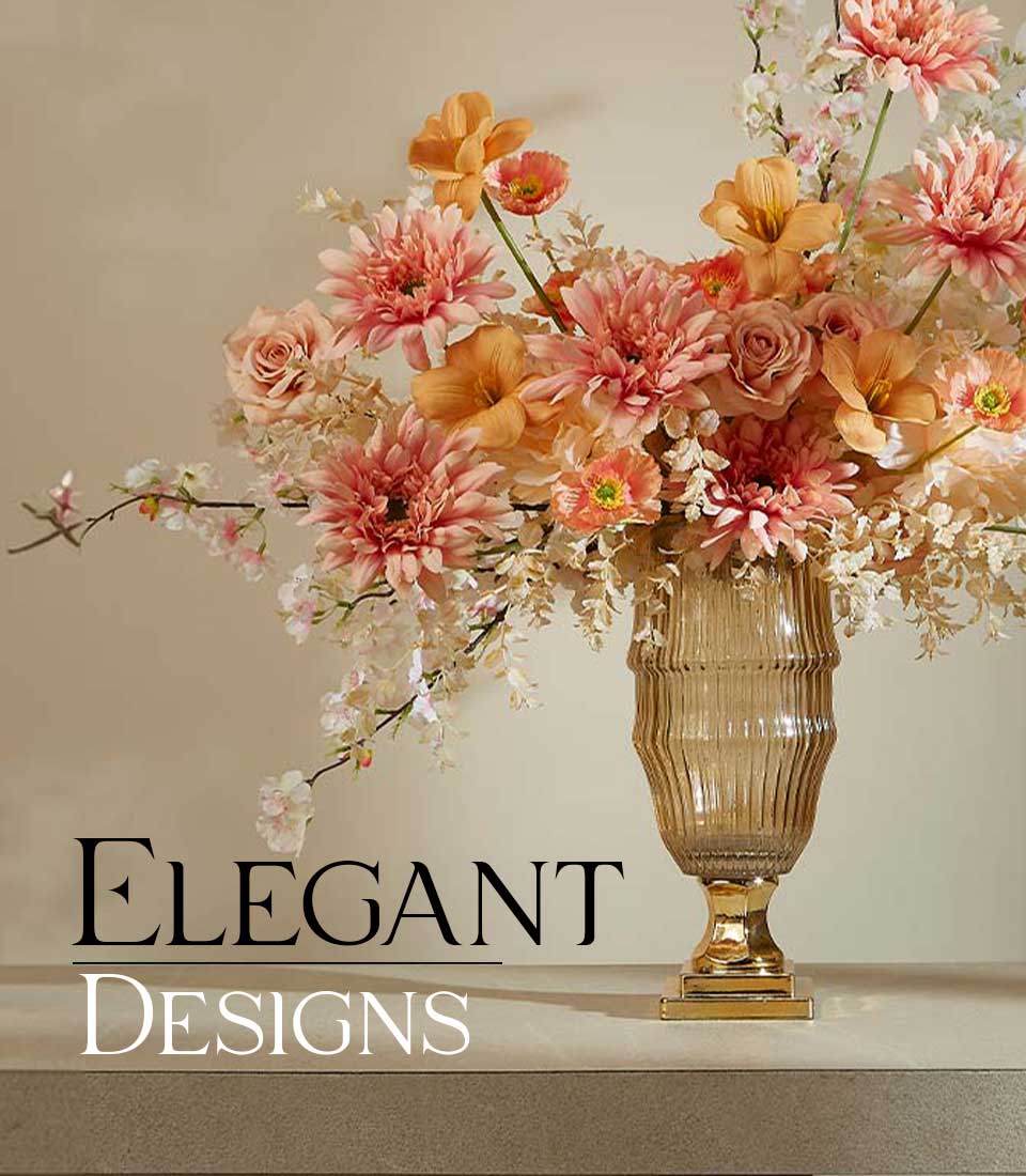 Whispering Woods of Fall artificial flower arrangement in amber ribbed vase with peach, coral, and pink dahlias and roses