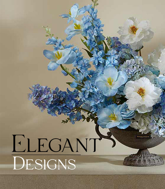 Elegant blue and white artificial peony arrangement in dark ornate metal urn with decorative handles
