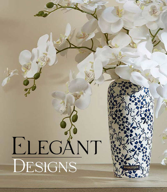 White orchid artificial flowers in blue-patterned ceramic vase, elegant floral arrangement for gifting