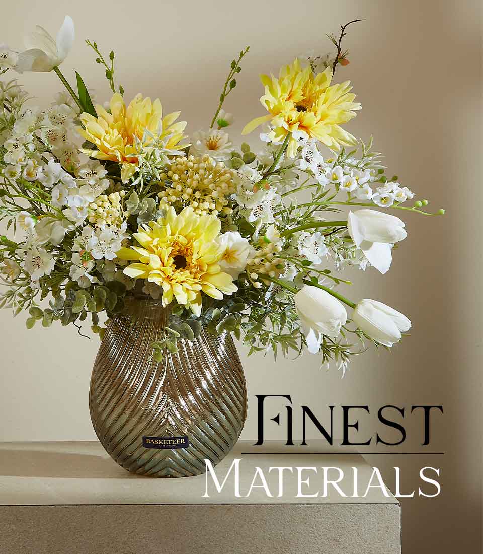 Sunny Serenity yellow gerbera daisies and white tulips arrangement in iridescent bronze-to-blue glass vase