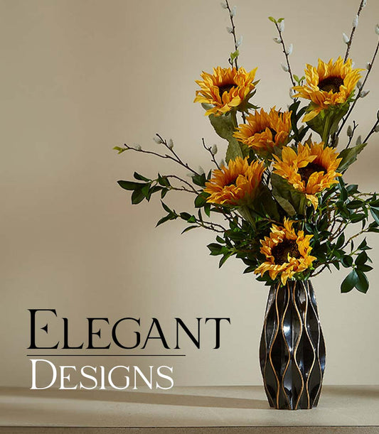 Bright yellow sunflowers with pussy willow in black textured vase with gold accents