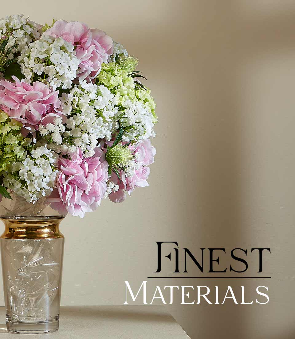 Pink hydrangeas and white flowers in gold-rimmed glass vase, luxury spring floral gift arrangement