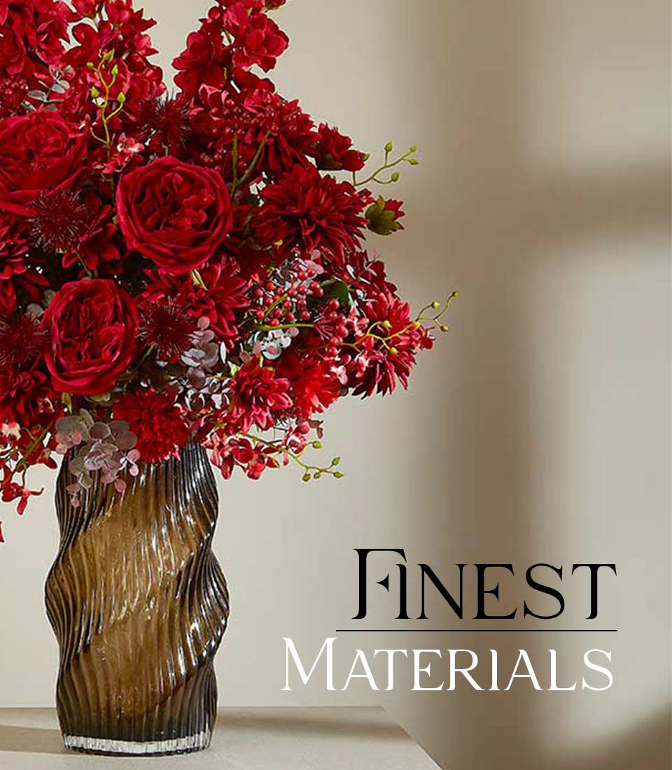 Graceful red artificial flower arrangement in textured smoky glass vase for luxury gifting